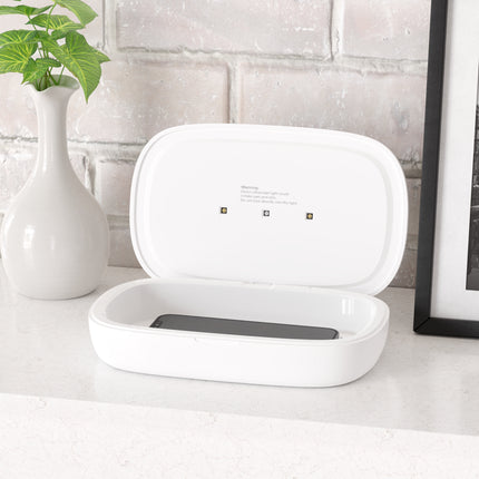 UV Phone Sanitizer & Wireless Charging Pad – Sleek Device for Hygiene & Convenience